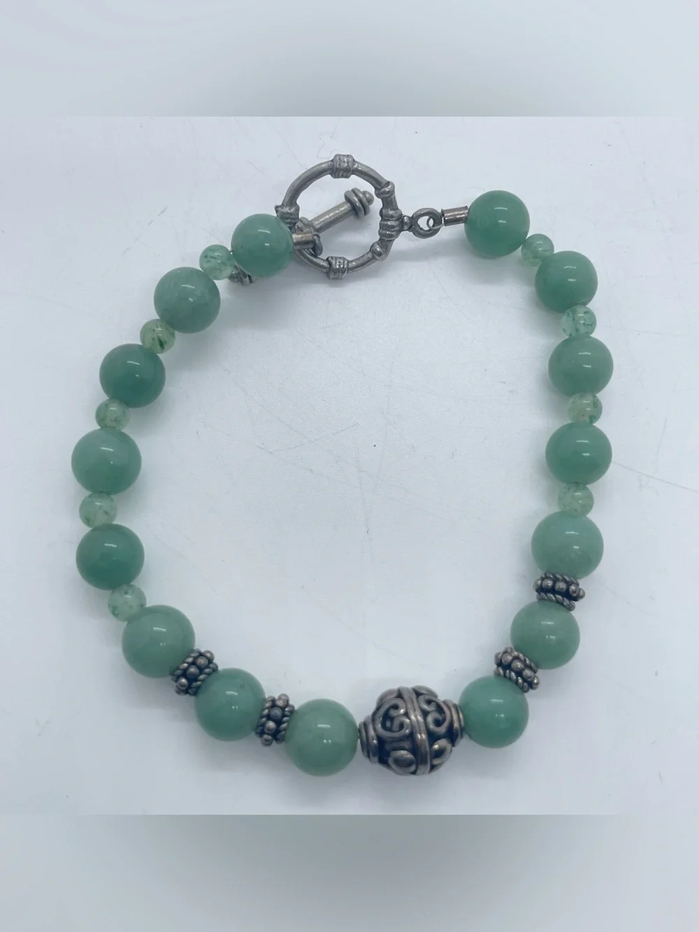 Green Stone Beaded Bracelet with Silver Tone Accents Toggle Closure